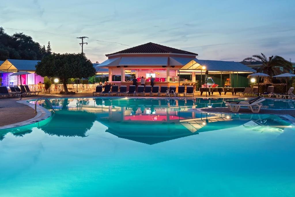 Panorama Sidari Hotel swimming pool with sea view and sun loungers