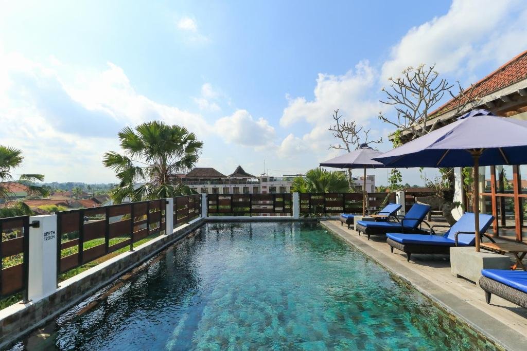 Traditional Balinese accommodation overlooking rice terraces at Tegal Sari Ubud