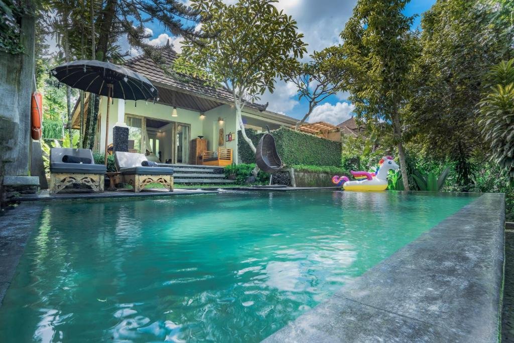 3Private pool villa surrounded by tropical gardens at KajaNe Mua in Ubud Bali