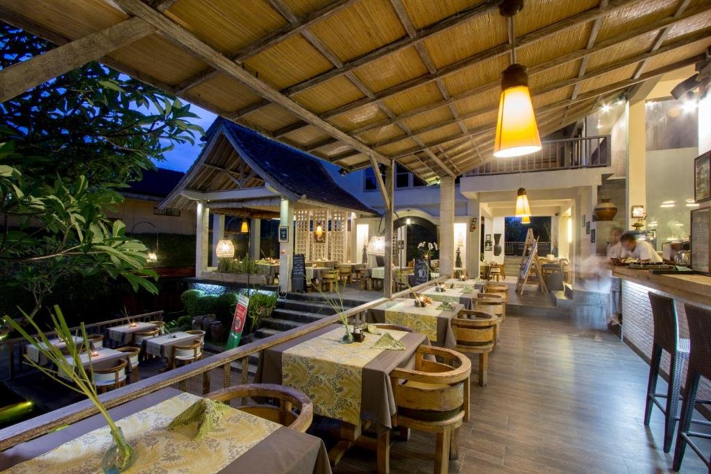 Romantic candlelight dinner setup at KajaNe Mua Ubud