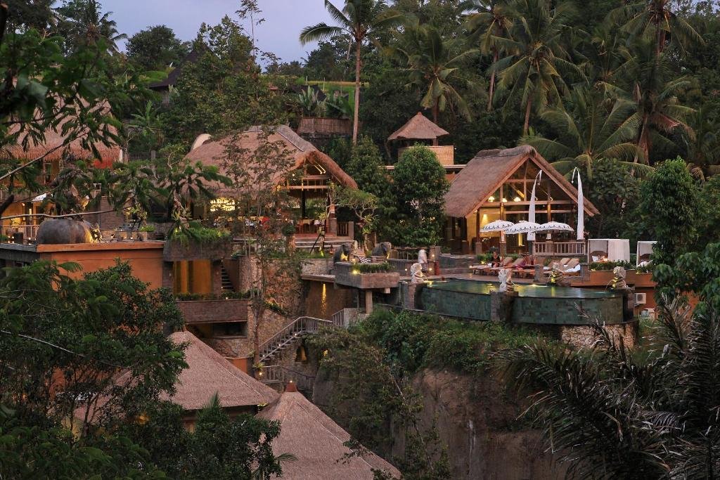 Infinity pool overlooking dense tropical jungle valley in Ubud Bali