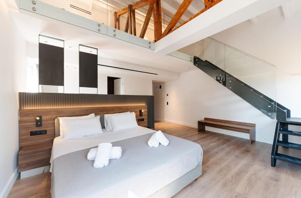 Elegant four-star hotel room with balcony overlooking the sea in Corfu