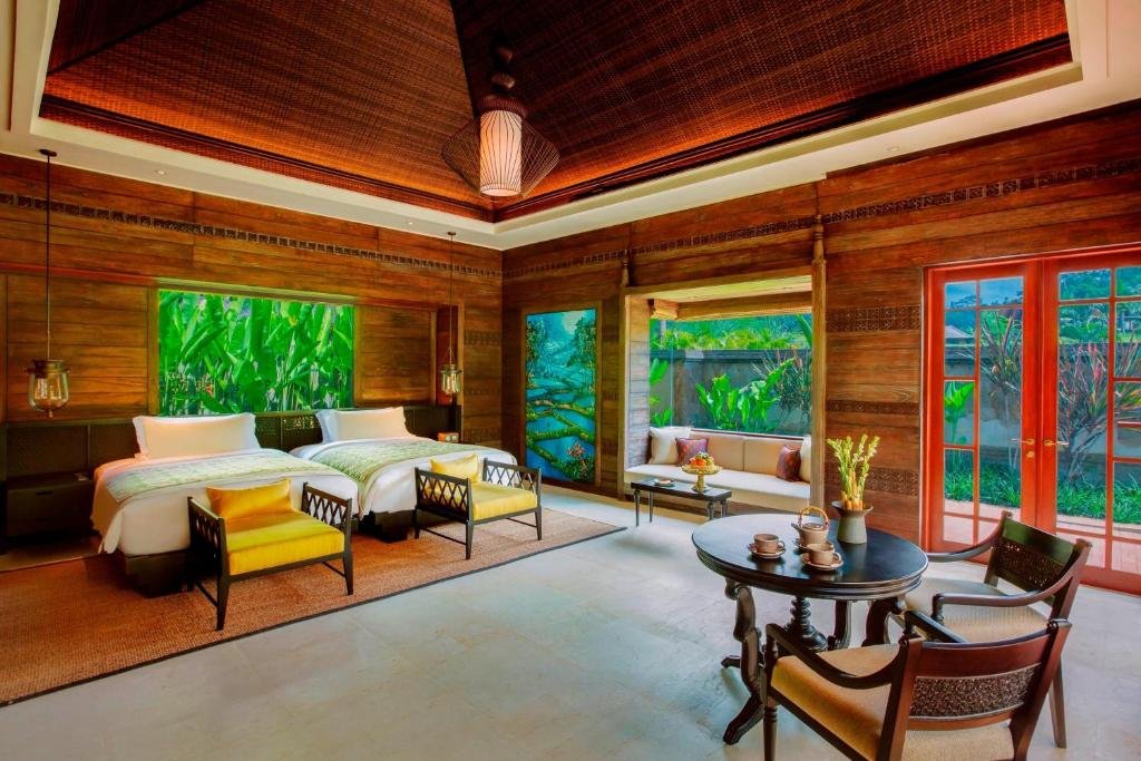 Five-star infinity pool overlooking Ayung River jungle valley