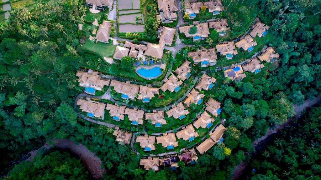 Luxury private villa with open-air living space overlooking jungle valley in Ubud