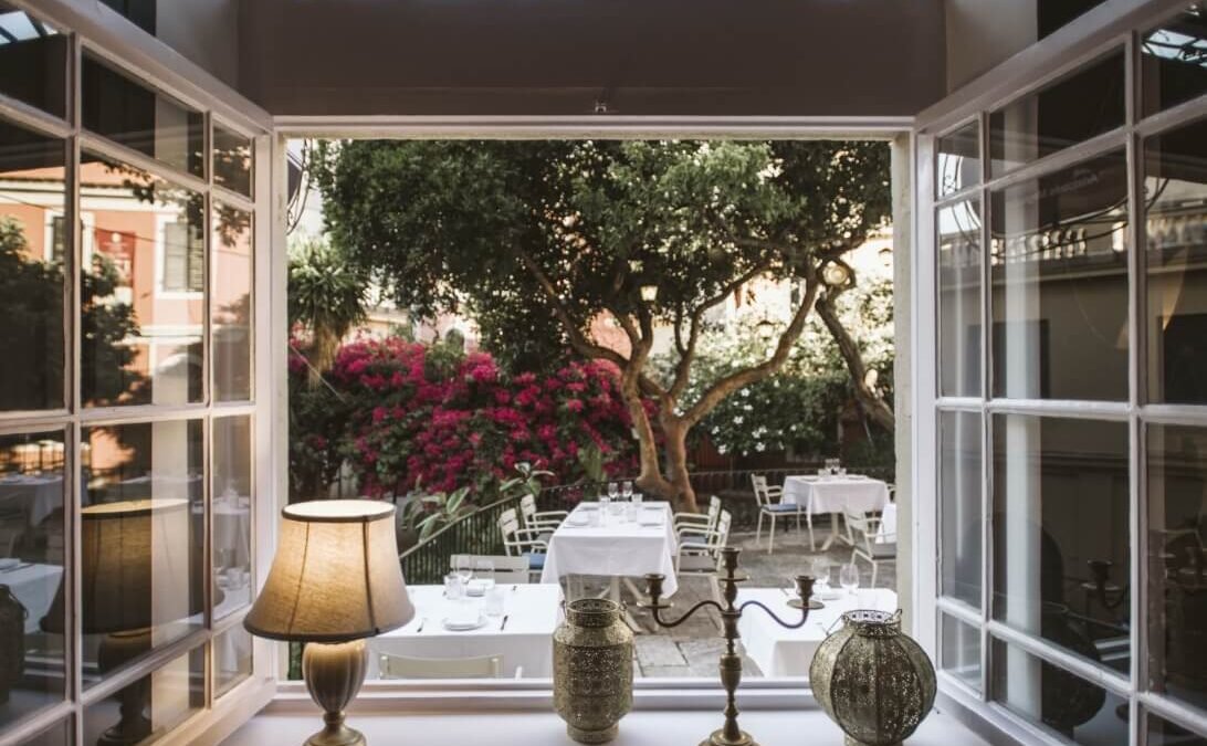Modern fine dining restaurant with artistic plated food and minimalist stylish interior in Corfu Town.