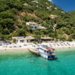 Beautiful aerial view of Corfu island with turquoise sea, beaches and traditional Greek architecture
