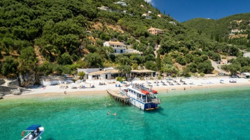 Beautiful aerial view of Corfu island with turquoise sea, beaches and traditional Greek architecture