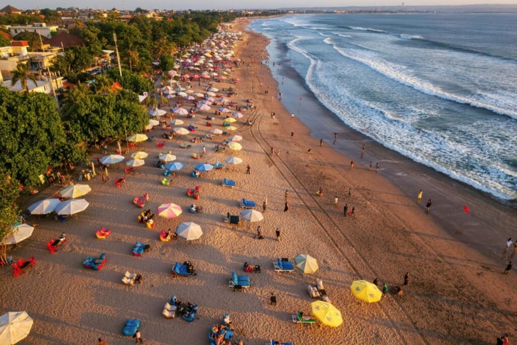 Beautiful Bali sunset with palm trees and beach scenery