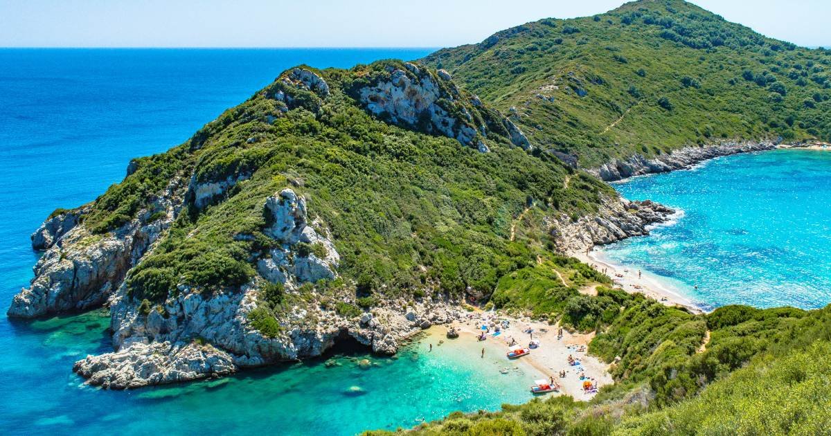 Aerial view of Corfu coastline with turquoise sea and hidden beaches in Greece