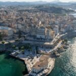 Corfu Town skyline with historic Venetian architecture, colorful buildings, and views of the Ionian Sea in Greece