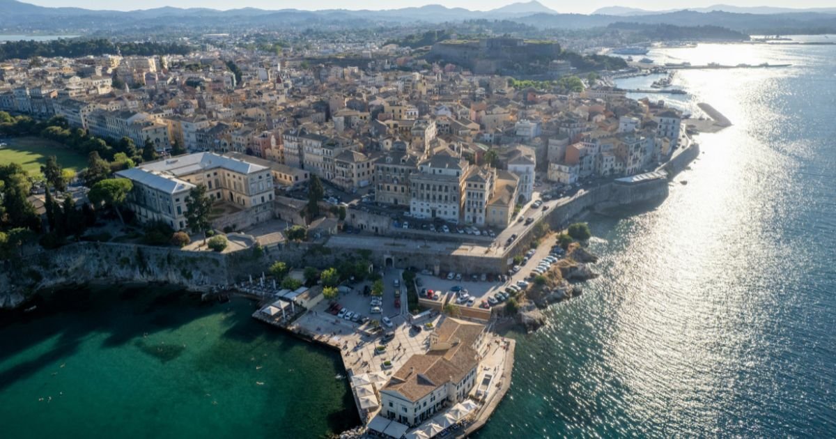 Corfu Town skyline with historic Venetian architecture, colorful buildings, and views of the Ionian Sea in Greece