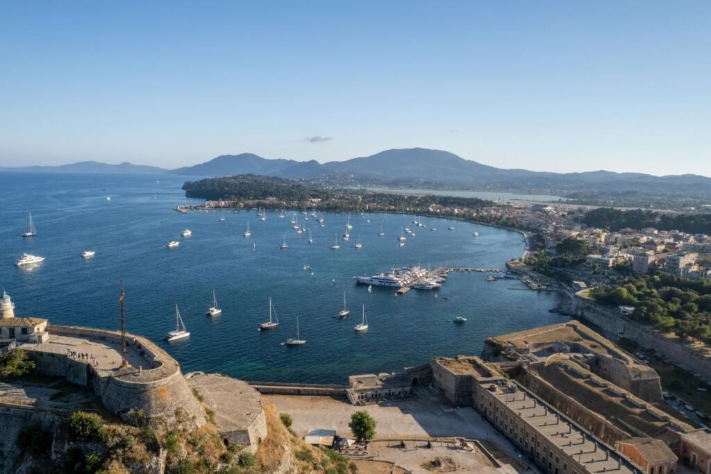 Charming streets of Corfu Town filled with traditional buildings, cafes, and local shops