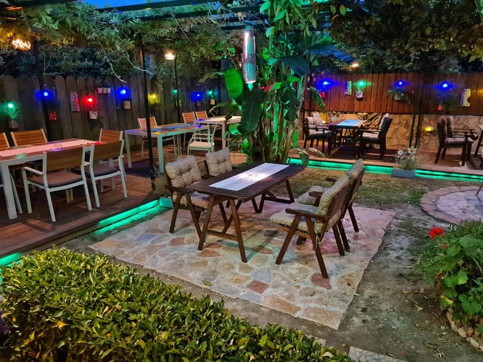 Garden seating area at Orchard Restaurant Sidari