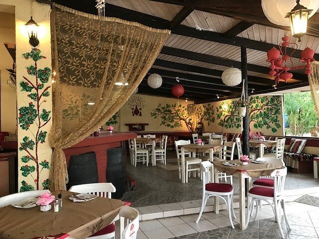Guests dining at The 50/50 Greek Taverna in Sidari