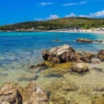 Thassos Greece coastline with crystal-clear turquoise sea and lush green hills