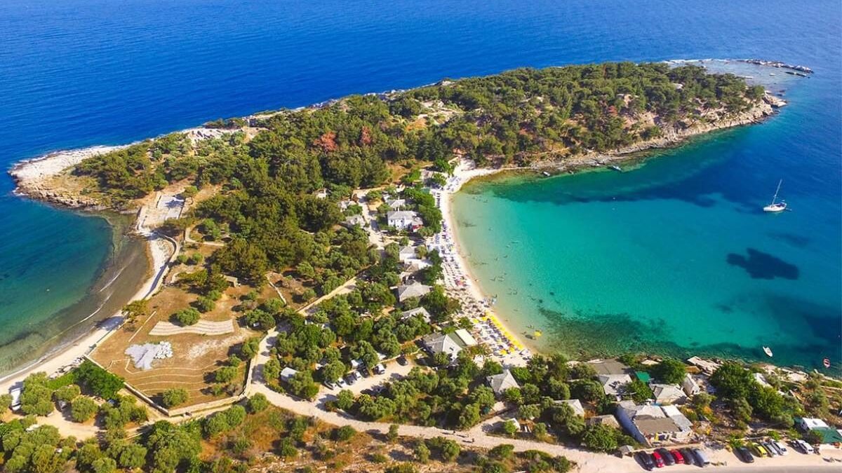 Aliki Beach in Thassos Greece with turquoise water and ancient ruins