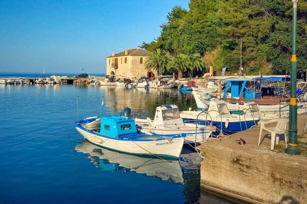 Limenas Thassos harbor with boats and blue sea