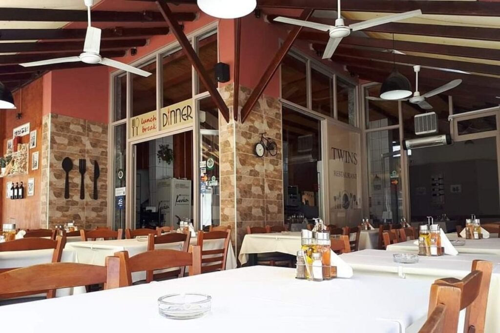 Guests dining at The Twins Restaurant in Limenas Thassos