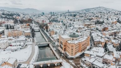 Sarajevo winter with snow-covered mountains and city