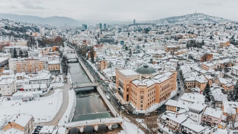 Sarajevo winter with snow-covered mountains and city