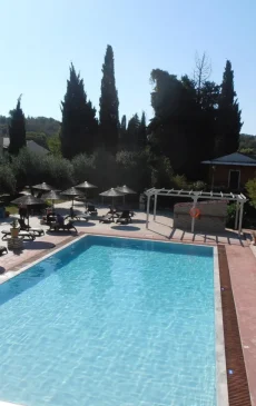Frosini Gardens swimming pool surrounded by greenery