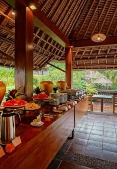Relaxing spa treatment room with natural stone décor at Pertiwi Resort Ubud