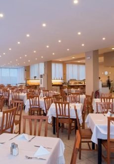 Panorama Sidari Hotel restaurant terrace with outdoor dining and sea view