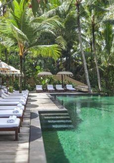 Spa treatment room with natural wood interior at Komaneka at Rasa Sayang Bali