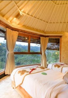 Romantic sunset view over tropical valley from luxury resort