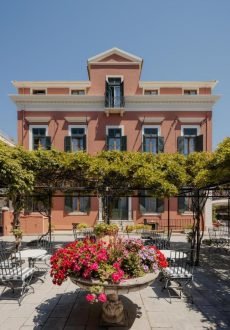 Bella Venezia Hotel surrounded by lush gardens in Corfu Town