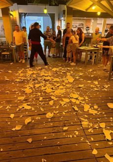 Traditional plate smashing celebration at Greek Village Taverna in Sidari