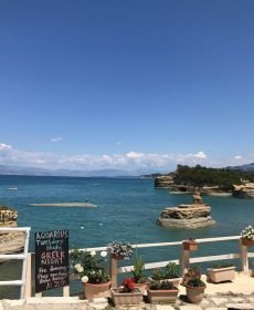 Waterfront terrace at Aquarius Taverna overlooking the sea