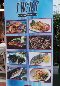 The Twins Restaurant sign in Limenas Thassos