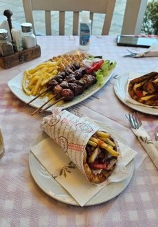 Guests enjoying dinner at Thraka Greek BBQ in Kassiopi