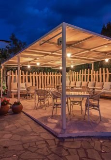 Hotel Lido Thassos outdoor seating area at night